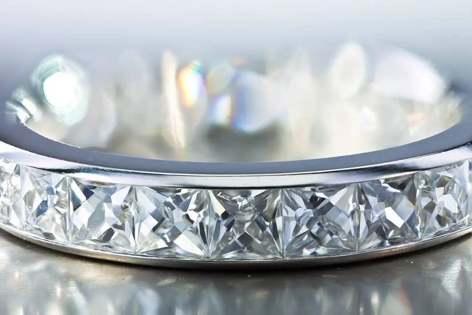 French Cut diamonds set in a channel eternity ring.