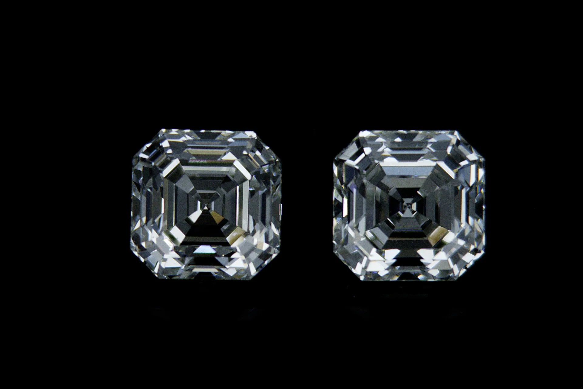 A matched pair of Asscher-cut diamonds, cut as twins.